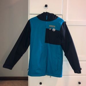 Blue and black Volcom snowboarding jacket
